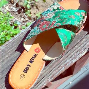 I’m selling sandals red and green printed sandals.